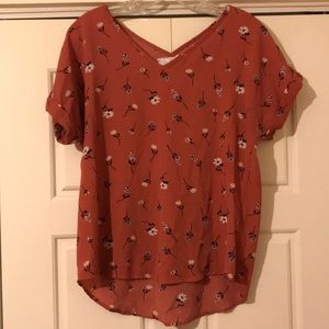 A dress shirt with flowers on it